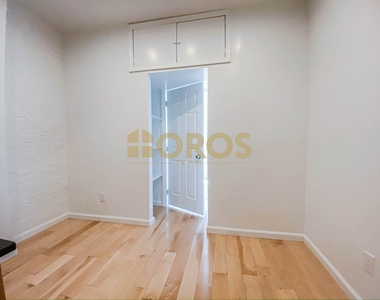 215 East 10th Street - Photo Thumbnail 3