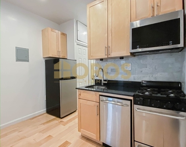 215 East 10th Street - Photo Thumbnail 2