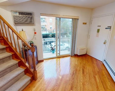 67-08 exeter street - Photo Thumbnail 1