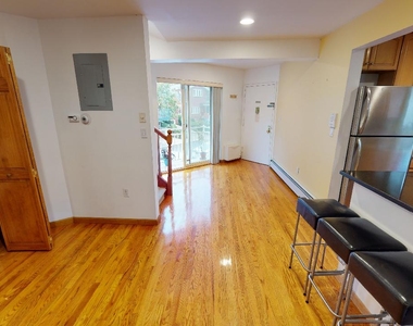 67-08 exeter street - Photo Thumbnail 4