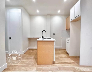 329 East 52nd Street - Photo Thumbnail 2