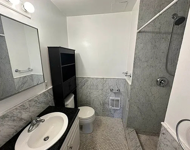 61 Village Road North - Photo Thumbnail 11