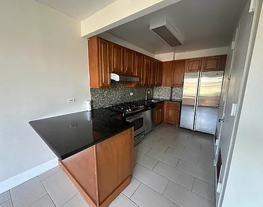 61 Village Road North - Photo Thumbnail 3