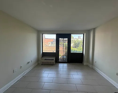 61 Village Road North - Photo Thumbnail 1