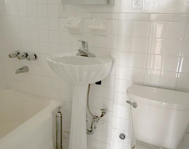302 E 38th St - Photo Thumbnail 4