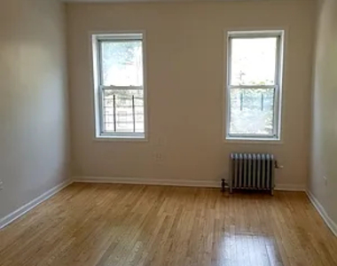 34-10 84th Street - Photo Thumbnail 2