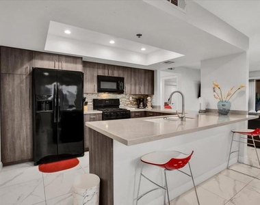 200 E Racquet Club Road - Photo Thumbnail 12