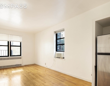 315 E 56th St - Photo Thumbnail 3