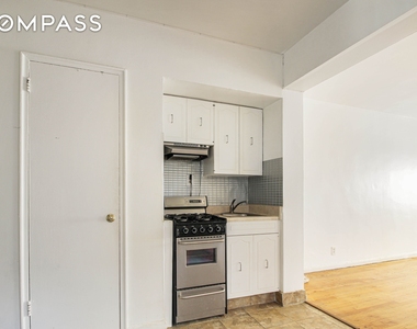 315 E 56th St - Photo Thumbnail 2
