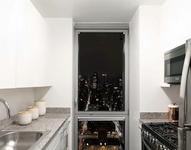   W 37th St. - Photo Thumbnail 2