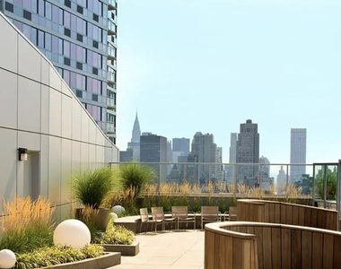   W 37th St. - Photo Thumbnail 3