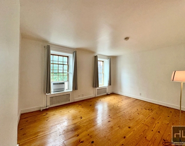 409 East 118 Street - Photo Thumbnail 1