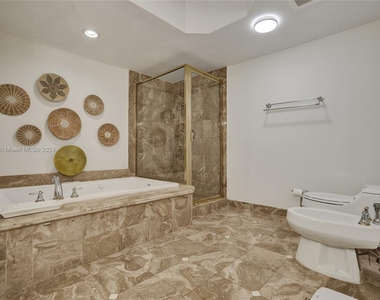 9559 Collins Ave - Photo Thumbnail 18