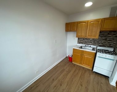 102-40 67th Road - Photo Thumbnail 1