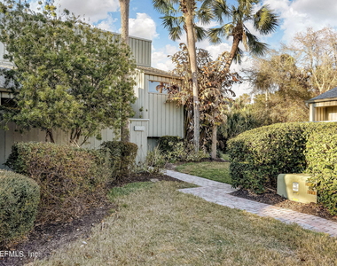 10025 Sawgrass Drive E - Photo Thumbnail 1