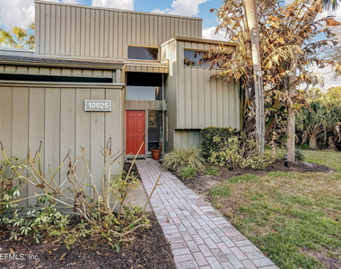 10025 Sawgrass Drive E - Photo Thumbnail 2