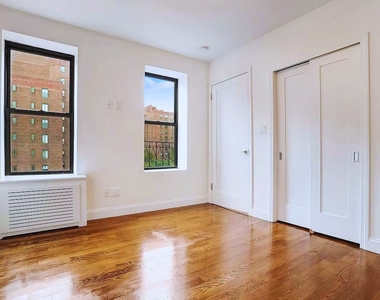 East 14th St (Bet Ave A &B) - Photo Thumbnail 2