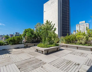 East 38th Street - Photo Thumbnail 3