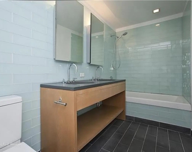 310 W 52nd St - Photo Thumbnail 1