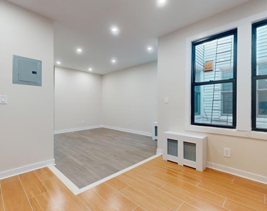 104-12 Metropolitan Avenue - Photo Thumbnail 4