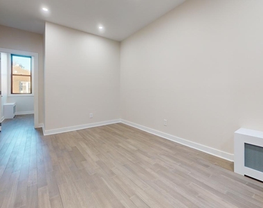 104-12 Metropolitan Avenue - Photo Thumbnail 2