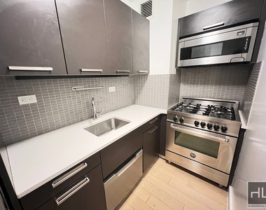 E 39th St - Photo Thumbnail 7