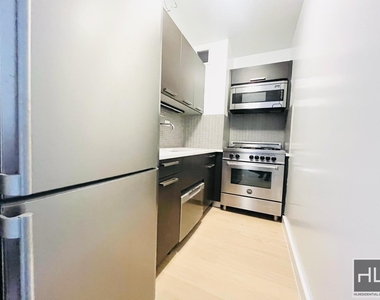 E 39th St - Photo Thumbnail 14
