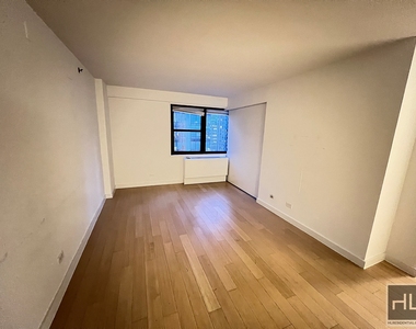E 39th St - Photo Thumbnail 10