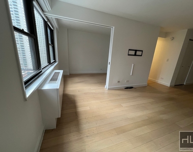 E 39th St - Photo Thumbnail 4