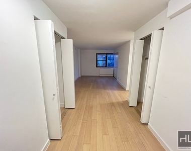 E 39th St - Photo Thumbnail 2