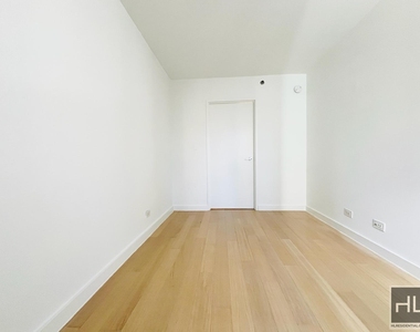 E 39th St - Photo Thumbnail 10