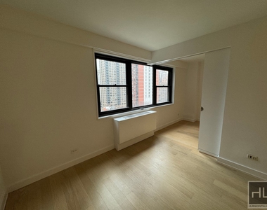 E 39th St - Photo Thumbnail 7
