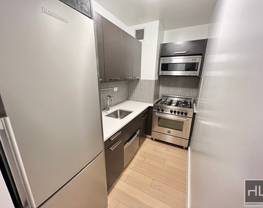 E 39th St - Photo Thumbnail 1