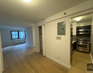 E 39th St - Photo Thumbnail 8