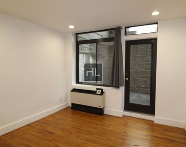 East 37 Street - Photo Thumbnail 5