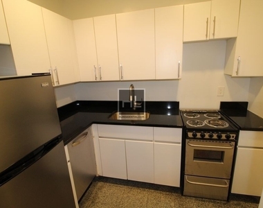 East 37 Street - Photo Thumbnail 3
