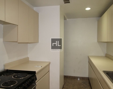 East 37 Street - Photo Thumbnail 8