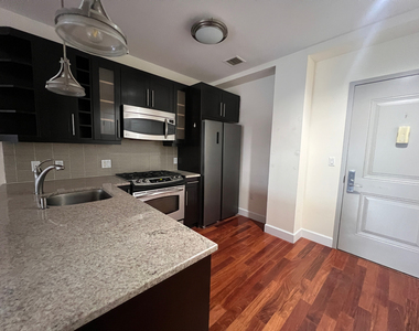 83-30 Kew Gardens Road - Photo Thumbnail 3