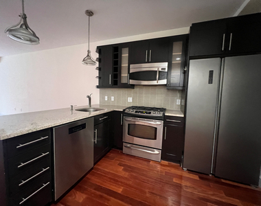83-30 Kew Gardens Road - Photo Thumbnail 2