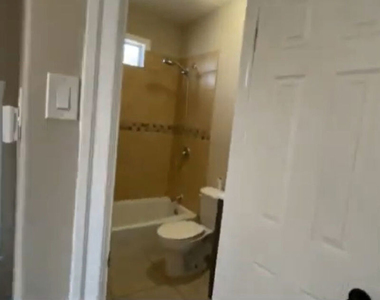 1284 W 38th Street - Photo Thumbnail 2