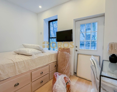 322 East 11th Street - Photo Thumbnail 1