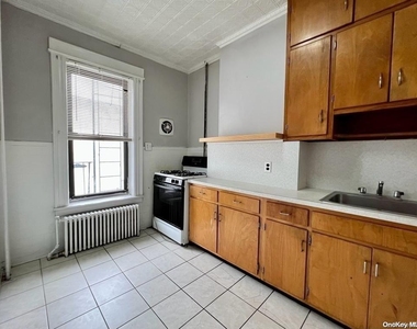 65-03 Fresh Pond Road - Photo Thumbnail 8