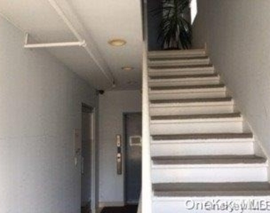 990 Westbury Road - Photo Thumbnail 2