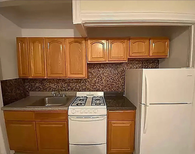 83-43 118th Street - Photo Thumbnail 2