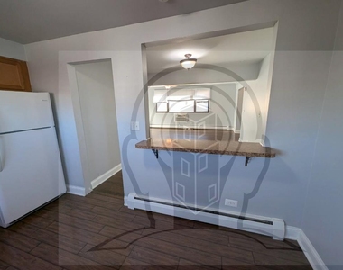 9016 Lamon Avenue - Photo Thumbnail 6