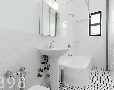48-16 46th Street - Photo Thumbnail 2