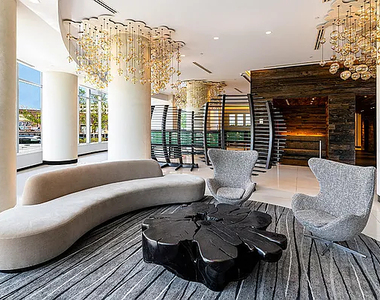 4545 Center BoulevardStunning 1 bed apartment featuring a home office area and private balcony with partial views of the East River. This home also features a spacious living area, open kitchen, ample closet space, and southern exposure. - Photo Thumbnail 6