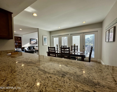 9942 Sawgrass Drive E - Photo Thumbnail 5
