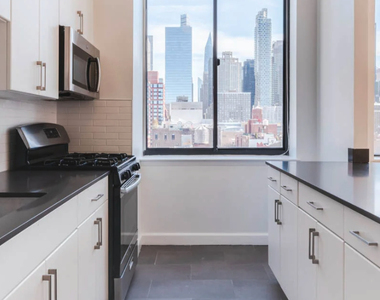 W 54th St. - Photo Thumbnail 2