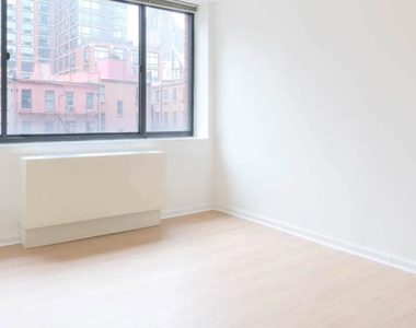 W 54th St. - Photo Thumbnail 3